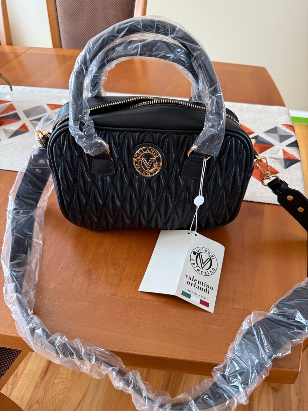 Valentino Orlandi Black Quilted Top-Handle Satchel with Gold Emblem